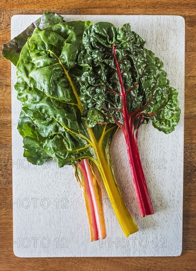 Rainbow chard leaves on cutting board