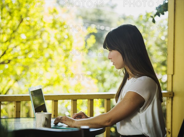 Young woman using laptop