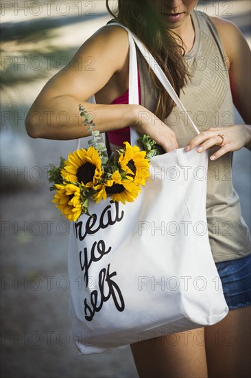 Young woman with shopping bag