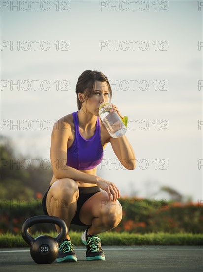 Young woman drinking water