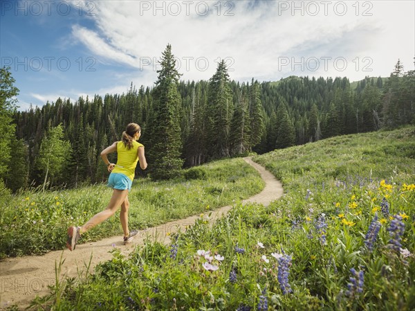 Mature woman running outdoors