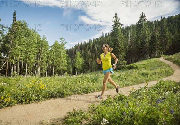 Mature woman running outdoors