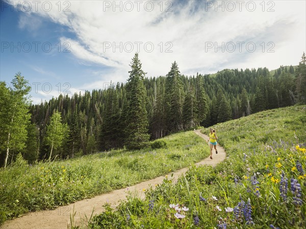 Mature woman running outdoors