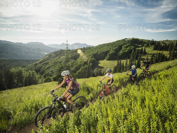 Parents with sons (10-11,12-13) during bike trip