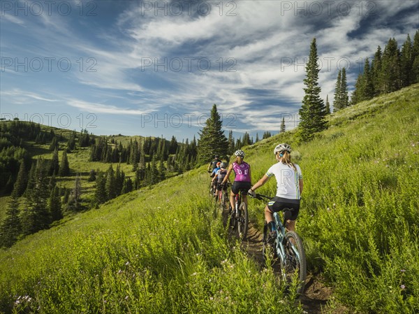 Parents with children (10-11,12-13, 14-15) during bike trip