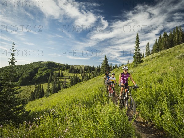 Parents with sons (10-11,12-13) during bike trip