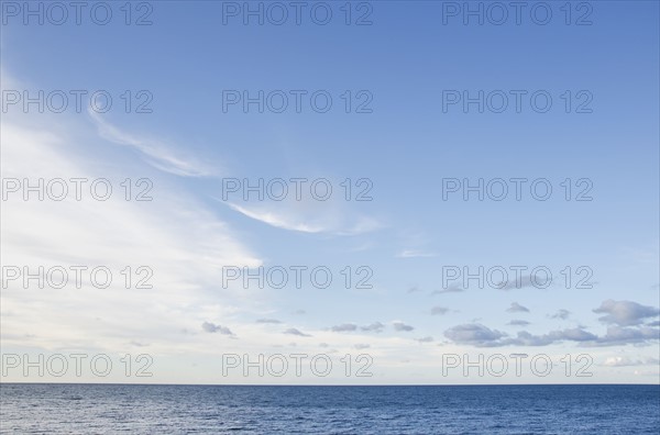 Sea with cloudy sky