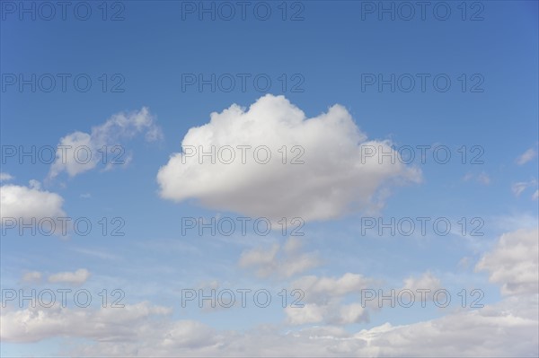 Cumulus clouds on blue sky