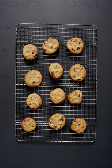 Baked chocolate cookies on cooling rack