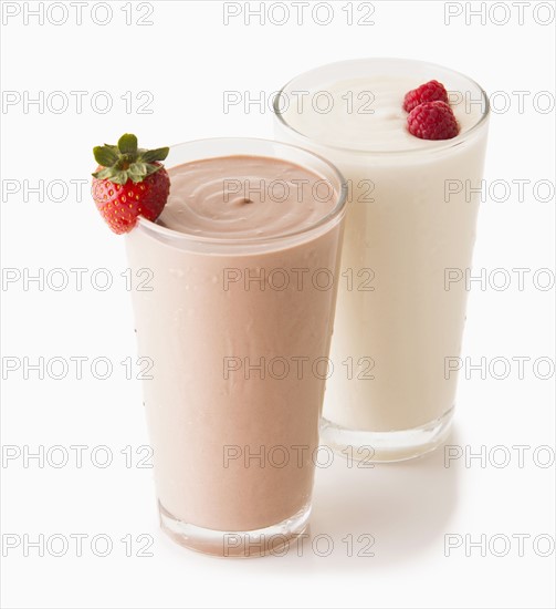 Smoothies in glasses decorated with fruit