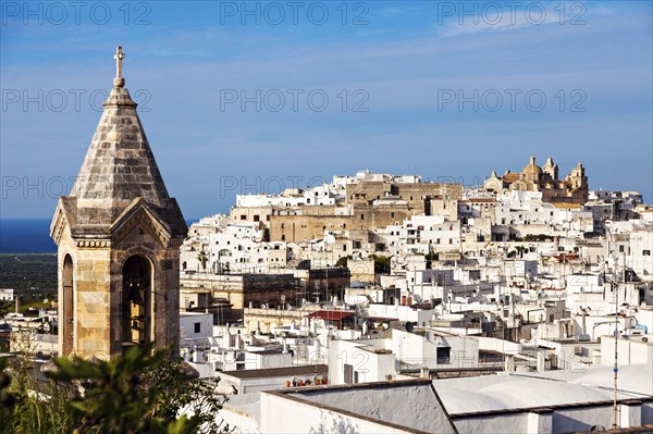 Townscape with church tower in foreground