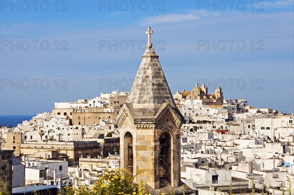 Townscape with church tower in foreground