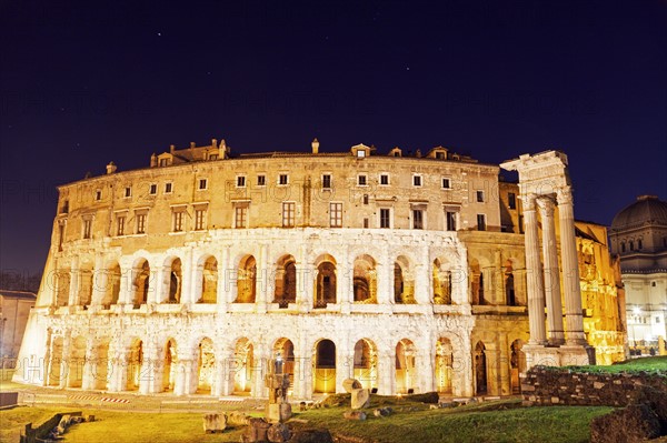 Illuminated theater of Marcellus at night