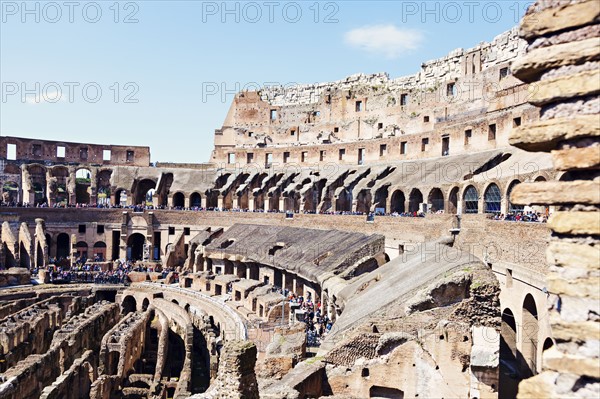 Ruins of Coliseum under blue sky