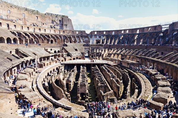 Ruins of Coliseum under blue sky