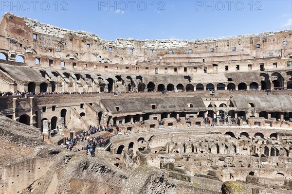 Ruins of Coliseum under blue sky