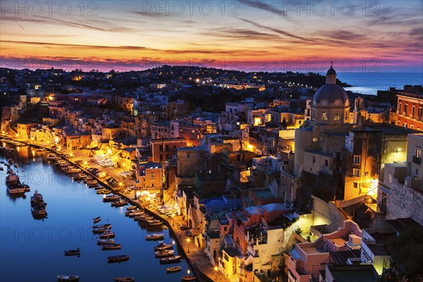 Illuminated townscape on Marina Corricella on Procida Island