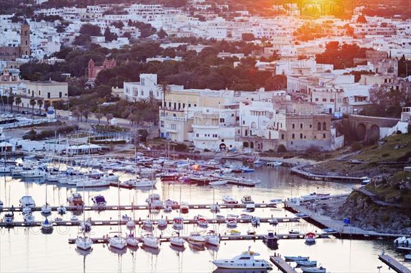 Townscape of Santa Maria di Leuca with moored yachts in foreground