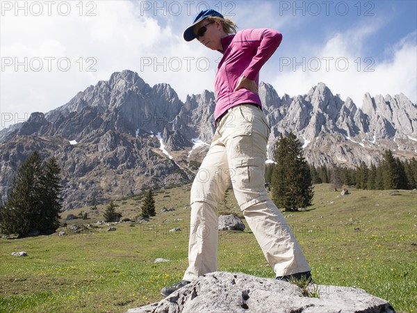 Woman hiking in Alps