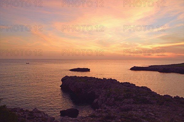 Moody sky above Ionian Sea at sunset