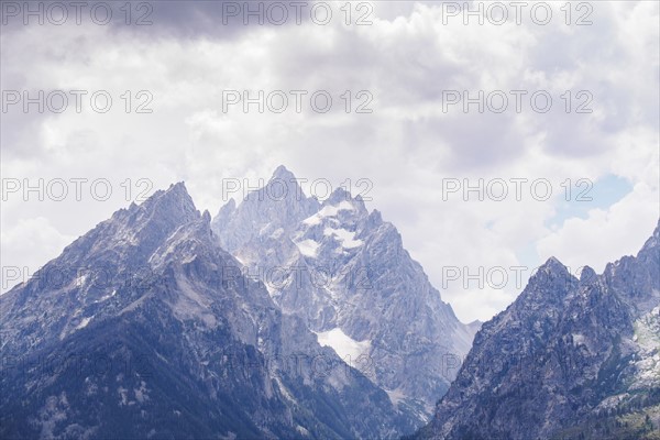 Mountain peaks in clouds