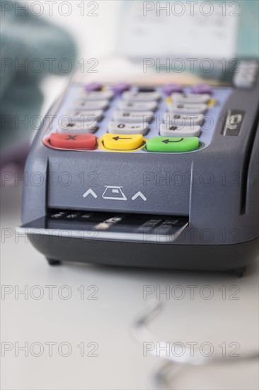 Credit card reader on counter.