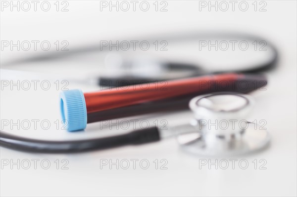 Blood sample and stethoscope.