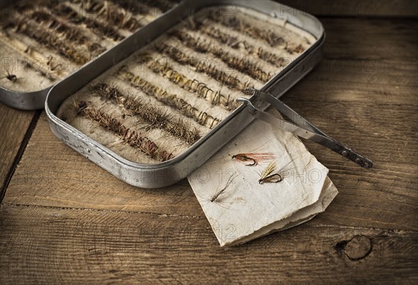 Fishing tackles in box.