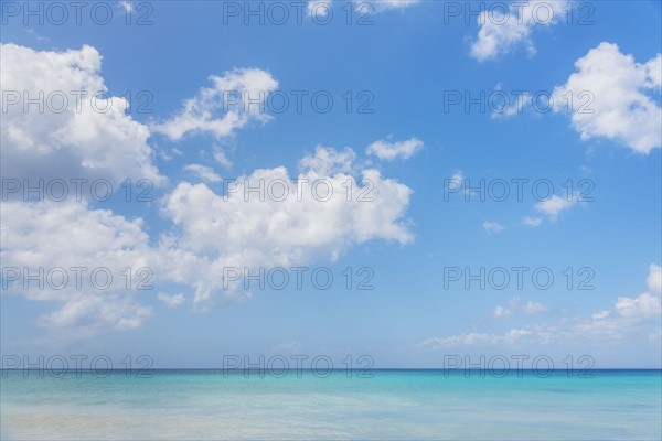 White clouds over tropical sea