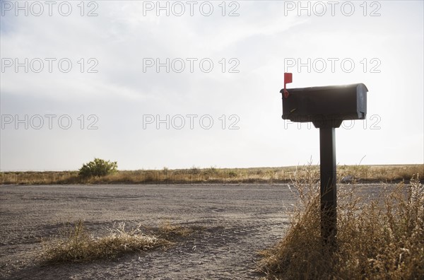 Mailbox by empty dirt road