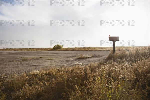 Mailbox by empty dirt road