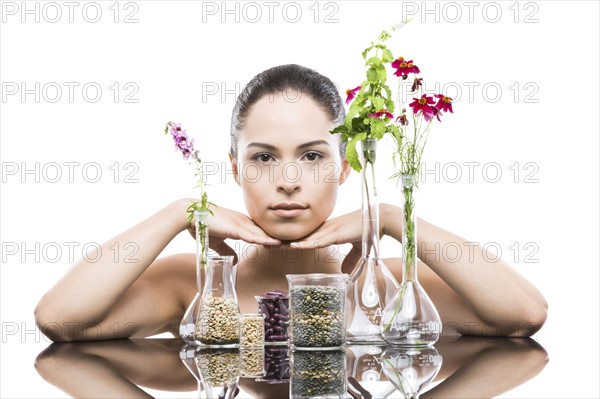 Young woman with vases in foreground
