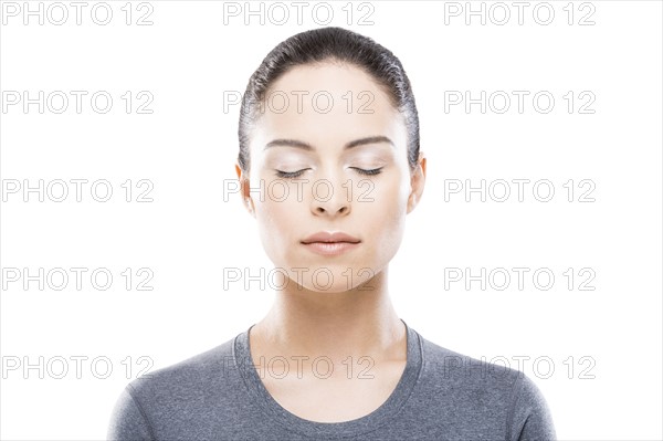 Portrait of young woman with closed eyes