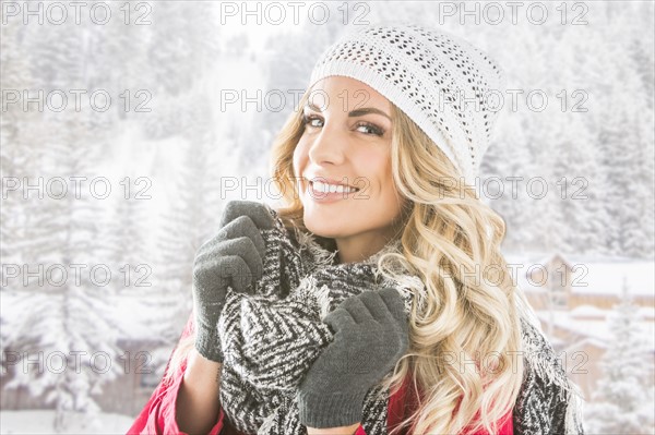 Portrait of young woman in winter wear