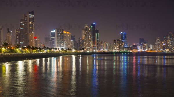 Illuminated cityscape at night