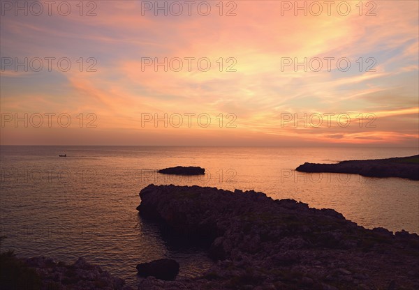 Colorful sunset sky over sea