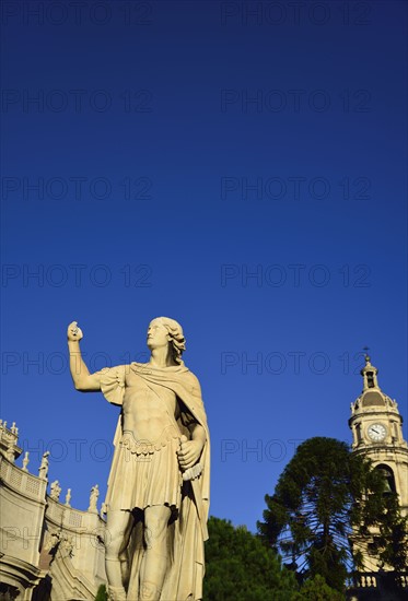 statue in front of 11th Century cathedral