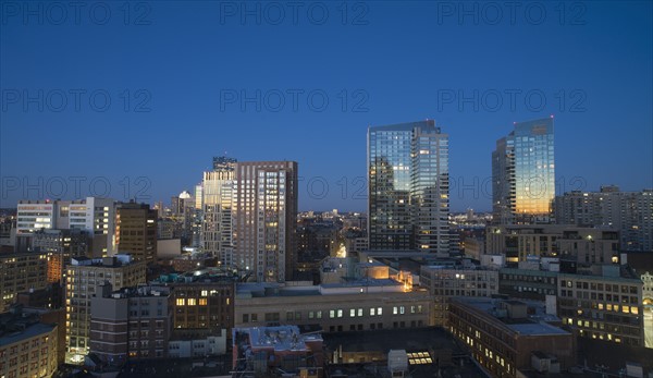 Modern downtown district at dawn