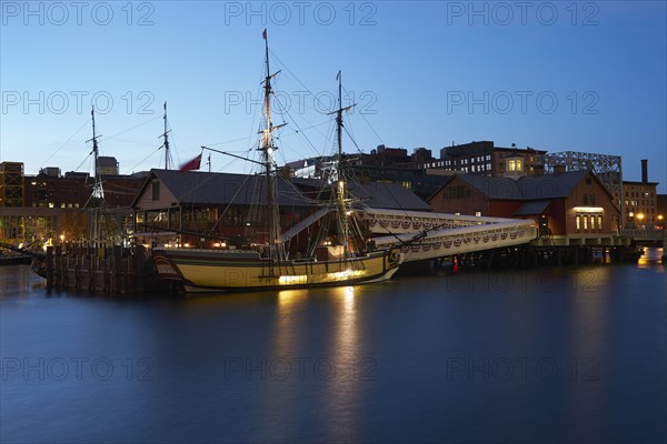 Tall ship and museum at dawn