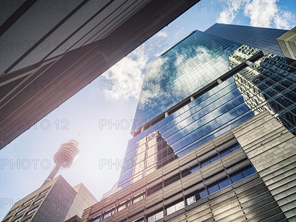 Clouds reflecting in glass buildings