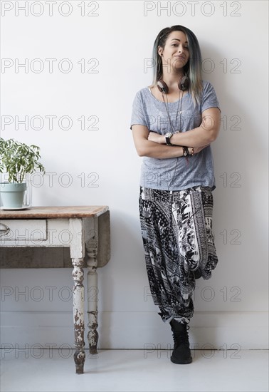 Portrait of young woman looking at camera.