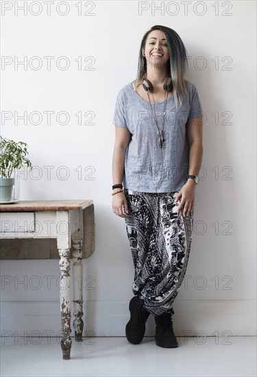 Portrait of young woman looking at camera.