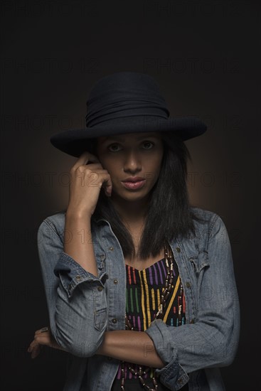 Portrait of woman looking at camera.