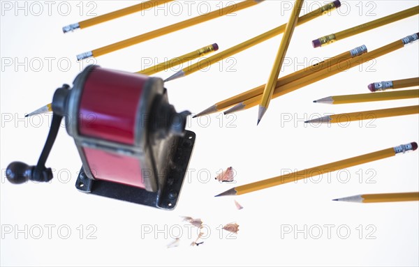 Pencils and antique pink pencil sharpener.