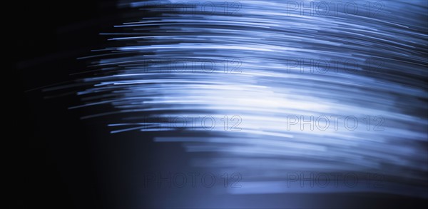 Blurred fiber optic cables.