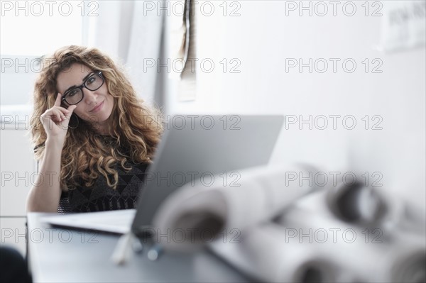 Woman working in office.