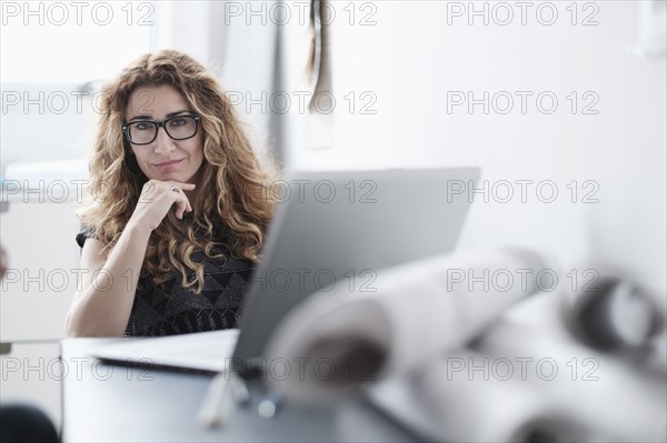 Woman working in office.