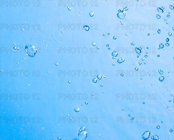 Bubbles on blue water