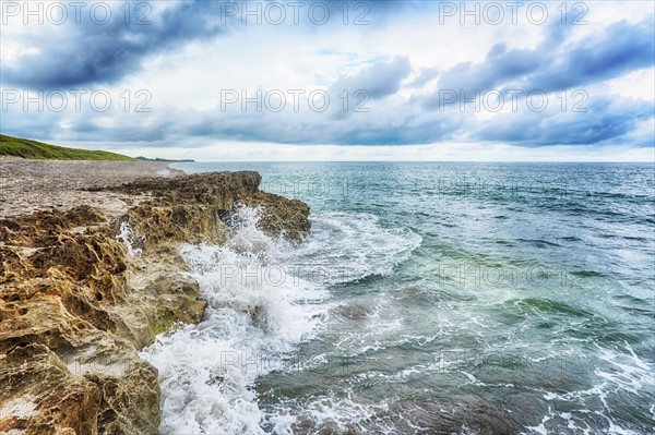 Wave splashing on coastline