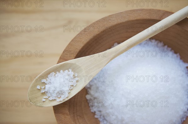 Sea salt in wooden bowl